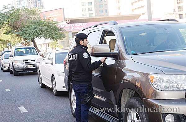 police-crack-down-on-parking-lot_kuwait