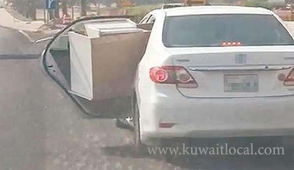 driving-with-the-car-door-open-–-you-will-get-five-citations_kuwait