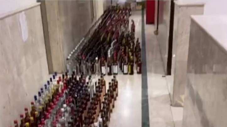 two-asians-arrested-with-4075-bottles-of-homemade-liquor_kuwait