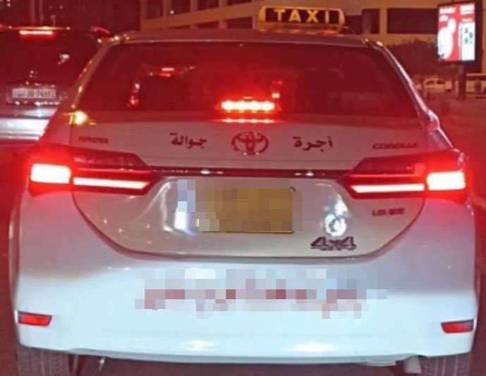taxi-car-seized-for-having-stickers-on-it_kuwait