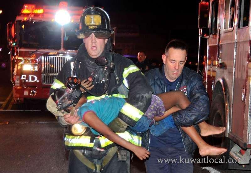 girl-rescued-from-building-fire_kuwait